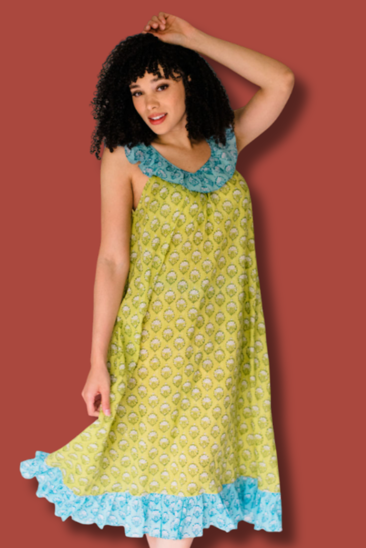 Woman wearing Sundara’s  Dorothy Top – relaxed, block-printed cotton sleepwear designed for comfort and beauty.