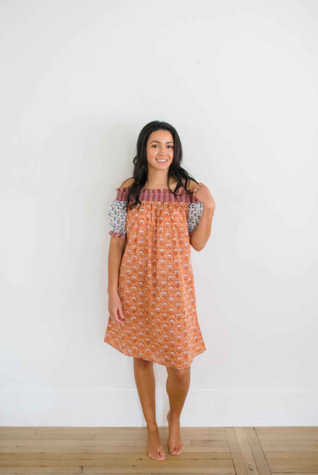 Woman wearing Graycee Nightgown by Sundara – a flowy, cotton nightgown featuring delicate hand-block prints and a relaxed, feminine silhouette for restful nights