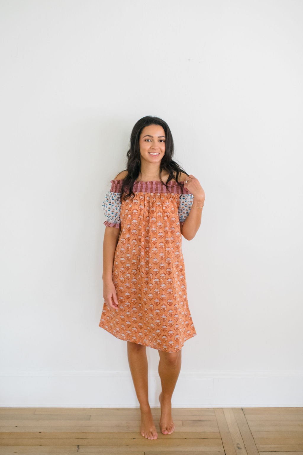 Woman wearing Graycee Nightgown by Sundara – a flowy, cotton nightgown featuring delicate hand-block prints and a relaxed, feminine silhouette for restful nights