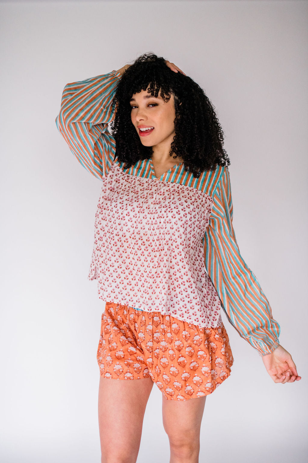 The Lauren Top by Sundara – a soft cotton pajama top with hand-block prints, featuring a button front and relaxed, timeless silhouette.