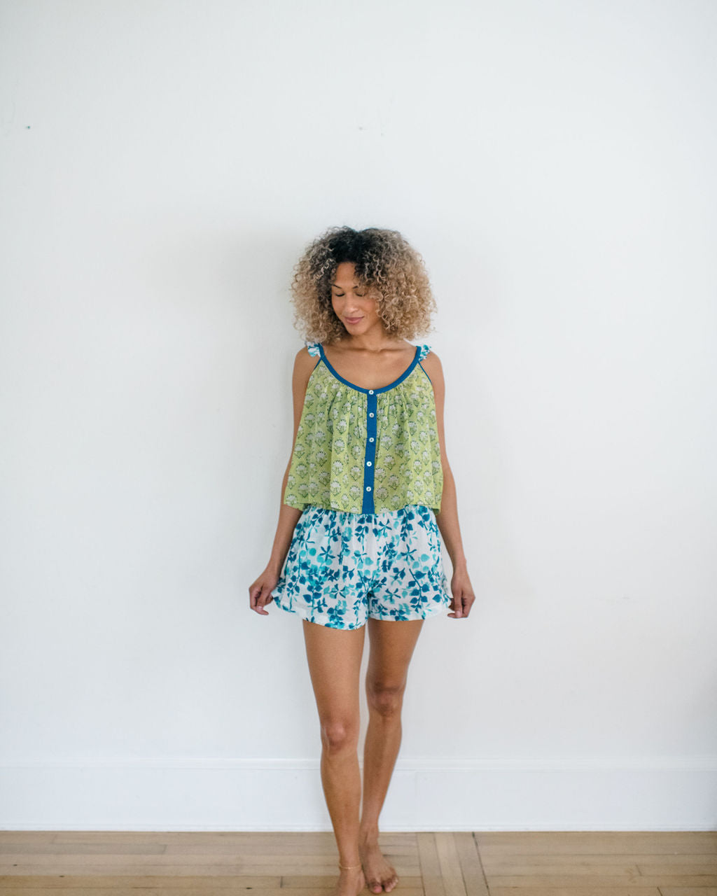 The Madi Top and Avery Sleep Shorts by Sundara – a comfortable cotton pajama set with hand-block prints, perfect for stylish and relaxed lounging