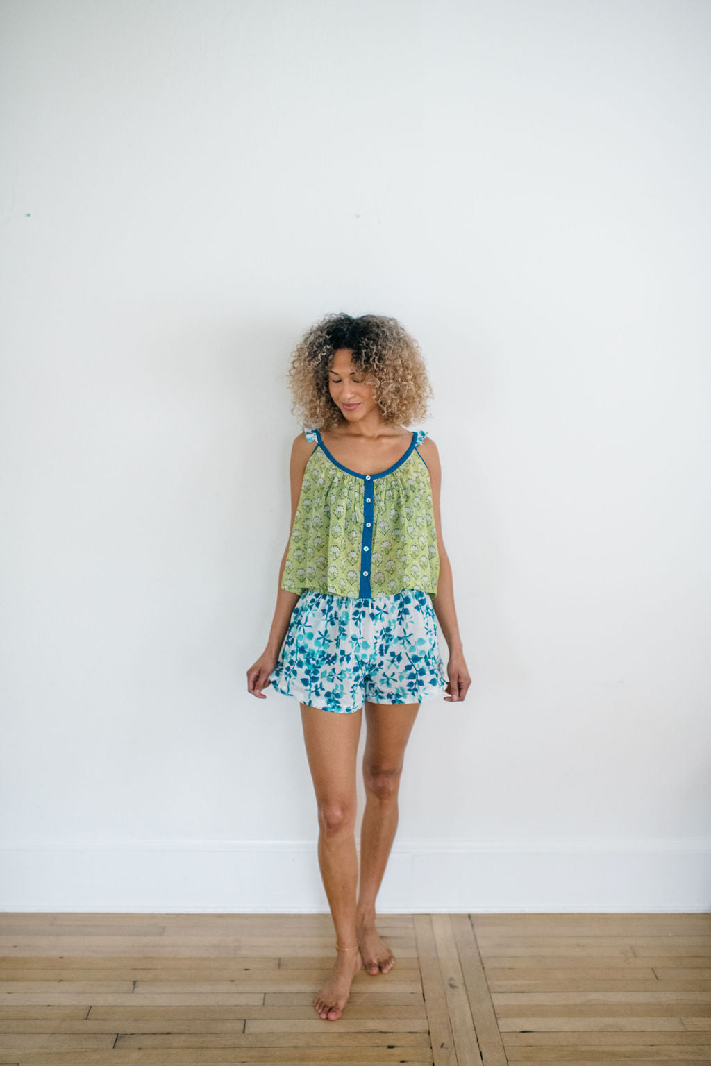 The Madi Top and Avery Sleep Shorts by Sundara – a comfortable cotton pajama set with hand-block prints, perfect for stylish and relaxed lounging