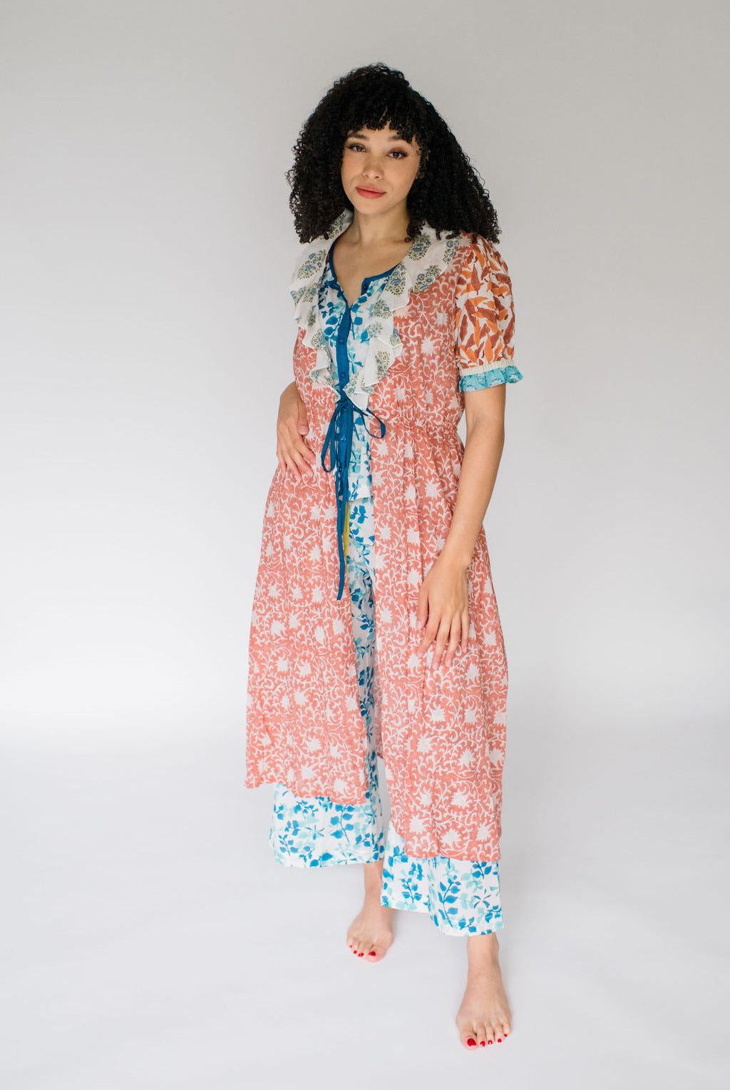 The Jeanne Robe by Sundara – a lightweight cotton robe with artisanal block prints and a relaxed belted silhouette, perfect for layering