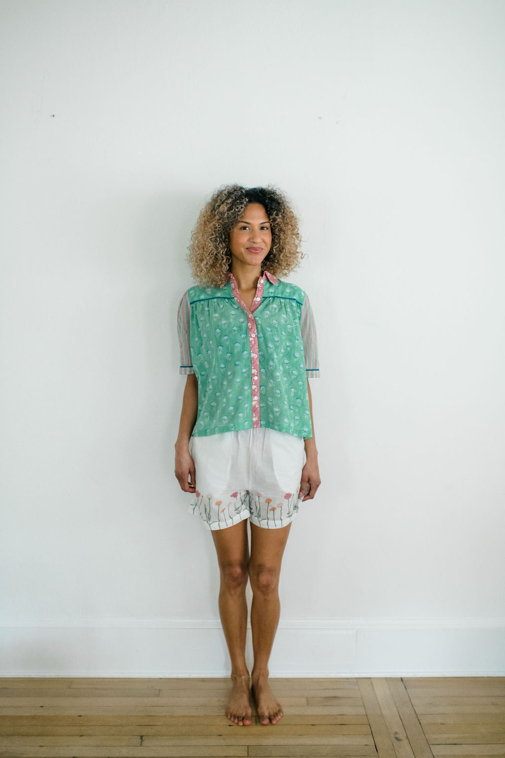 Woman wearing the Dorothy Top and Jae Short by Sundara – comfortable cotton sleepwear with hand-block prints, offering relaxed style and effortless comfort.”
