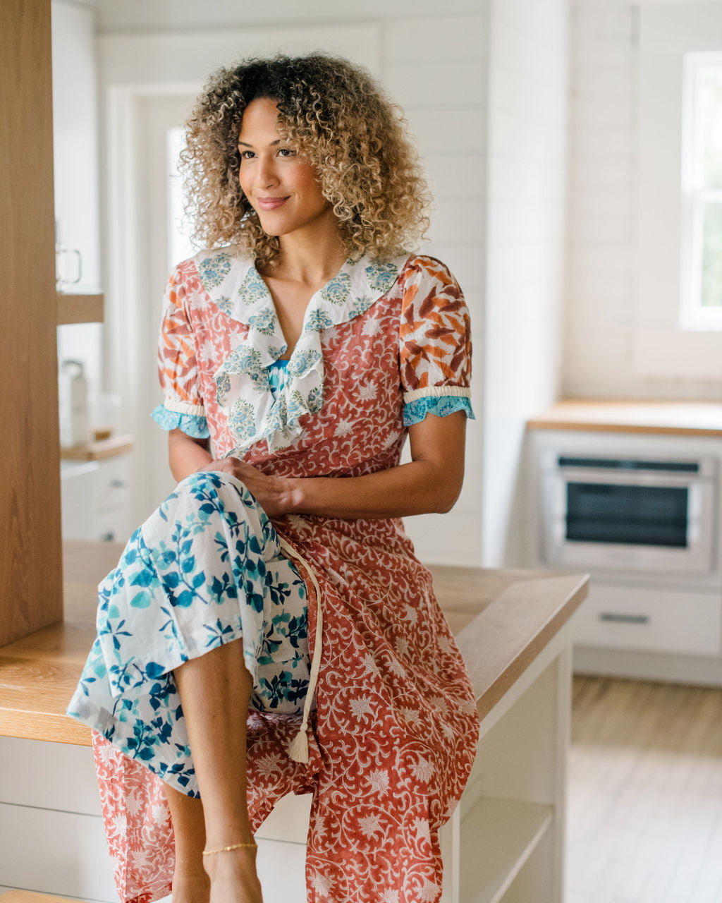 The Jeanne Robe by Sundara – a lightweight cotton robe with artisanal block prints and a relaxed belted silhouette, perfect for layering