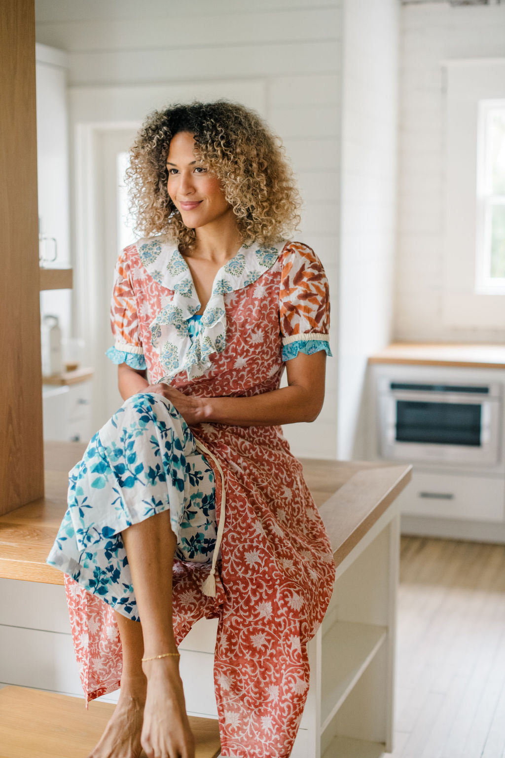 The Jeanne Robe by Sundara – a lightweight cotton robe with artisanal block prints and a relaxed belted silhouette, perfect for layering