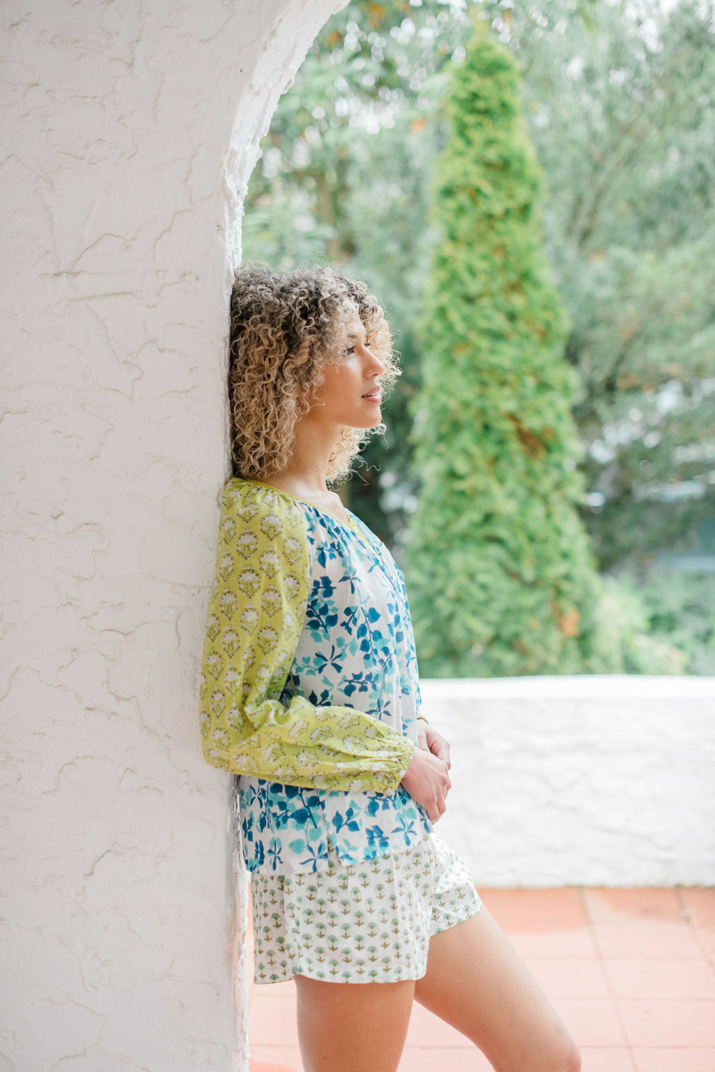 “The Ryan Top and Avery Sleep Shorts by Sundara – a breathable cotton pajama set with relaxed fit and hand-block prints, perfect for laid-back lounging.