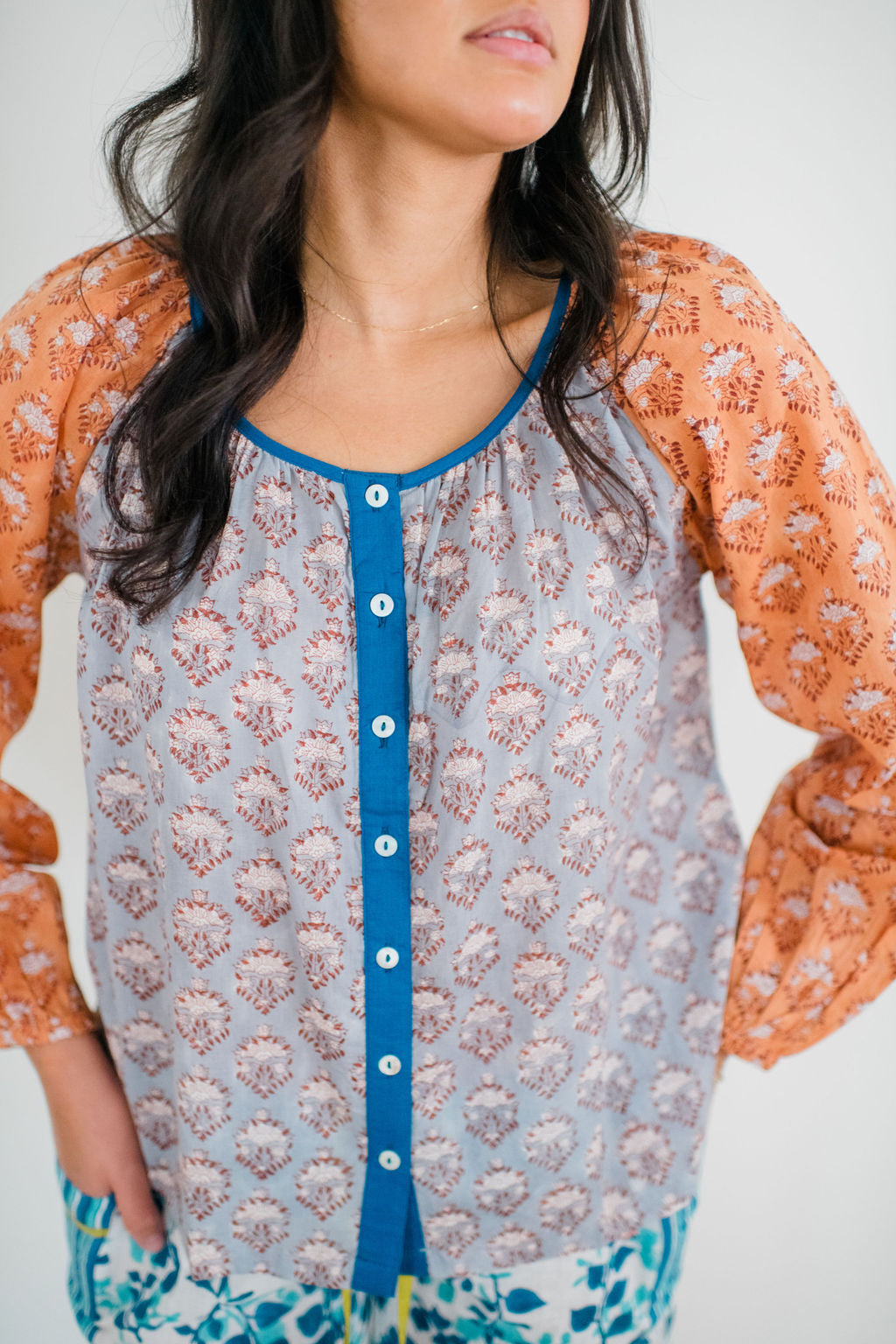 The Ryan Sleep Top by Sundara – a soft cotton pajama top with relaxed fit and hand-block printed details, designed for all-day comfort