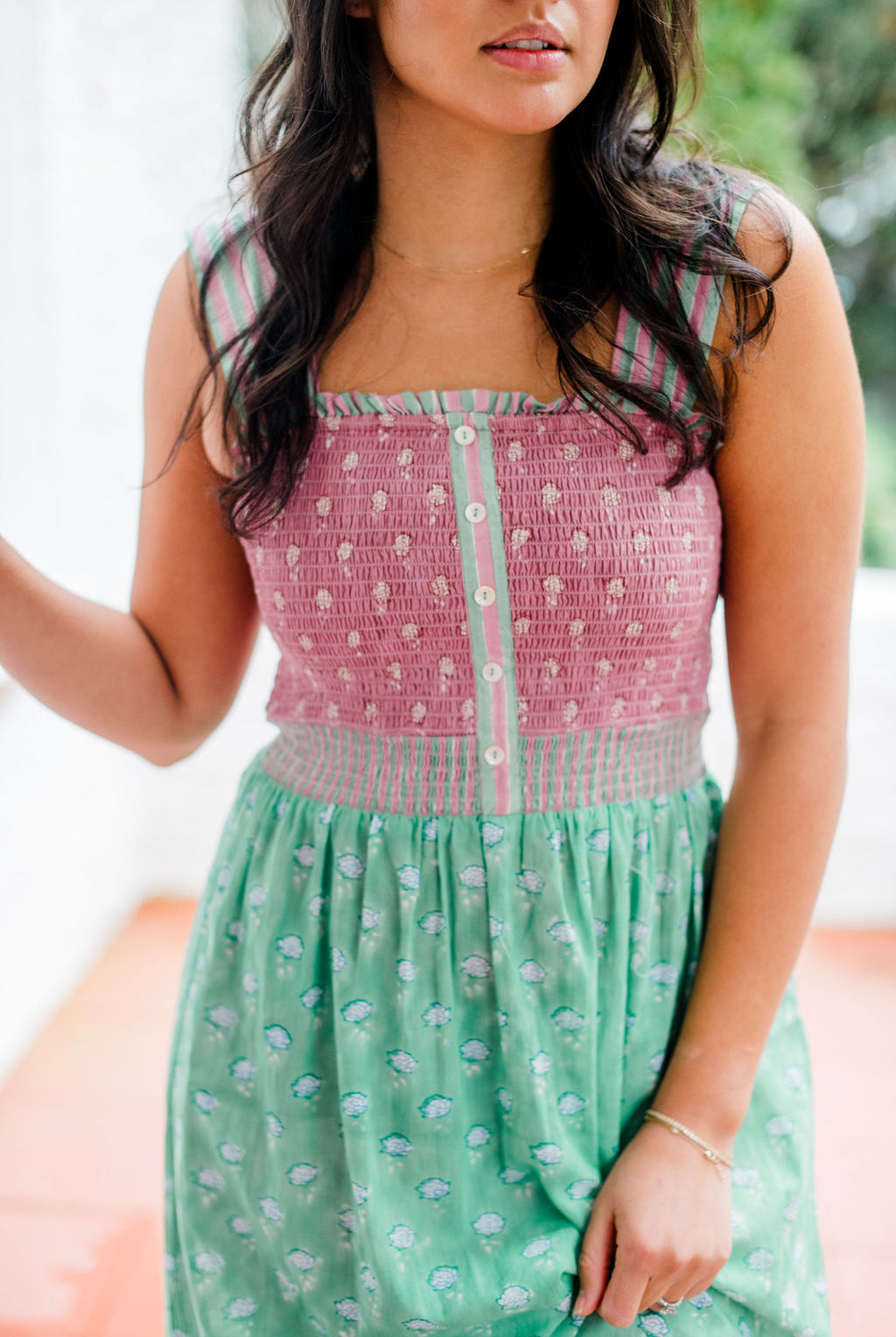 Woman wearing the Stella Nightgown by Sundara – a soft, cotton nightgown with elegant hand-block prints, offering a relaxed and cozy look for peaceful nights.