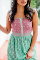 Woman wearing the Stella Nightgown by Sundara – a soft, cotton nightgown with elegant hand-block prints, offering a relaxed and cozy look for peaceful nights.