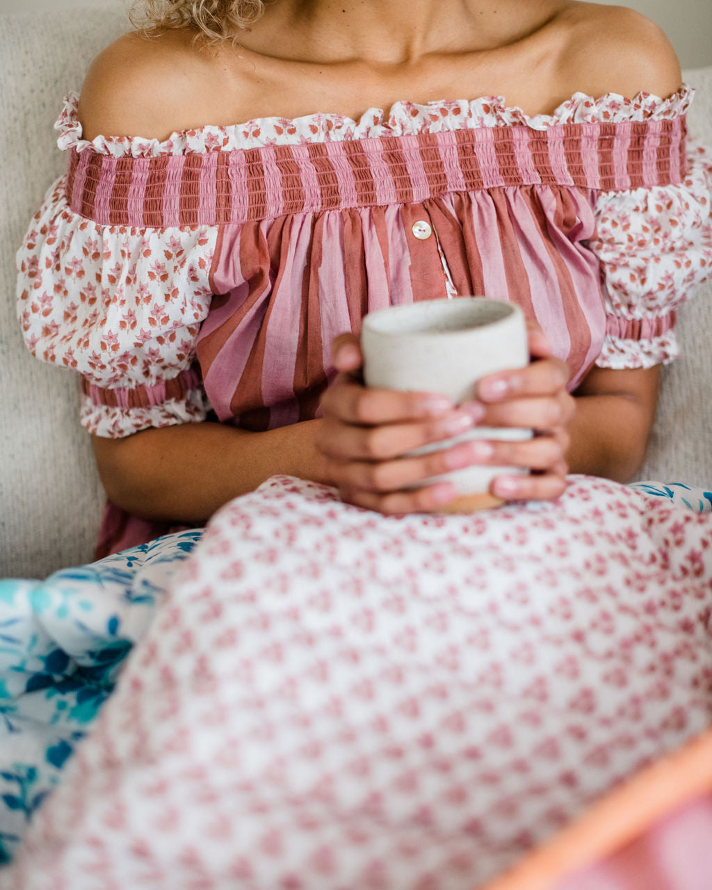 Close up of the Winnie Top by Sundara – a relaxed cotton pajama top with off-the-shoulder styling, featuring delicate hand-block prints for a laid-back, stylish look.