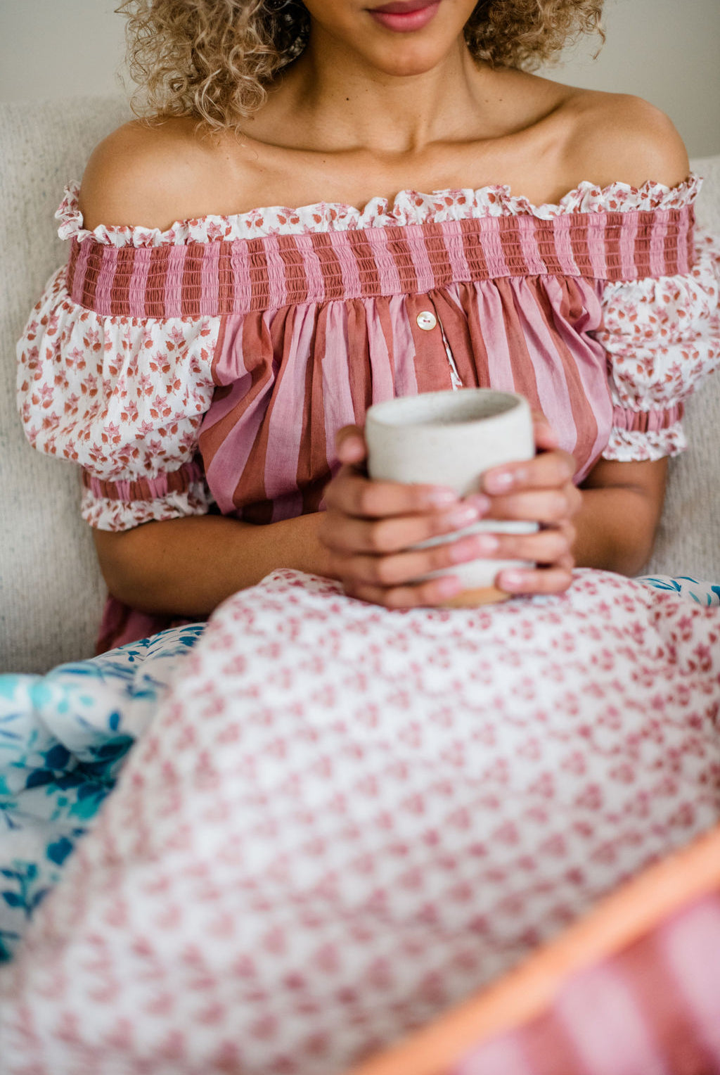 Close up of the Winnie Top by Sundara – a relaxed cotton pajama top with off-the-shoulder styling, featuring delicate hand-block prints for a laid-back, stylish look.