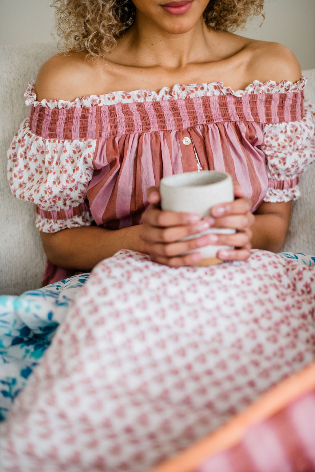 Close up of the Winnie Top by Sundara – a relaxed cotton pajama top with off-the-shoulder styling, featuring delicate hand-block prints for a laid-back, stylish look.