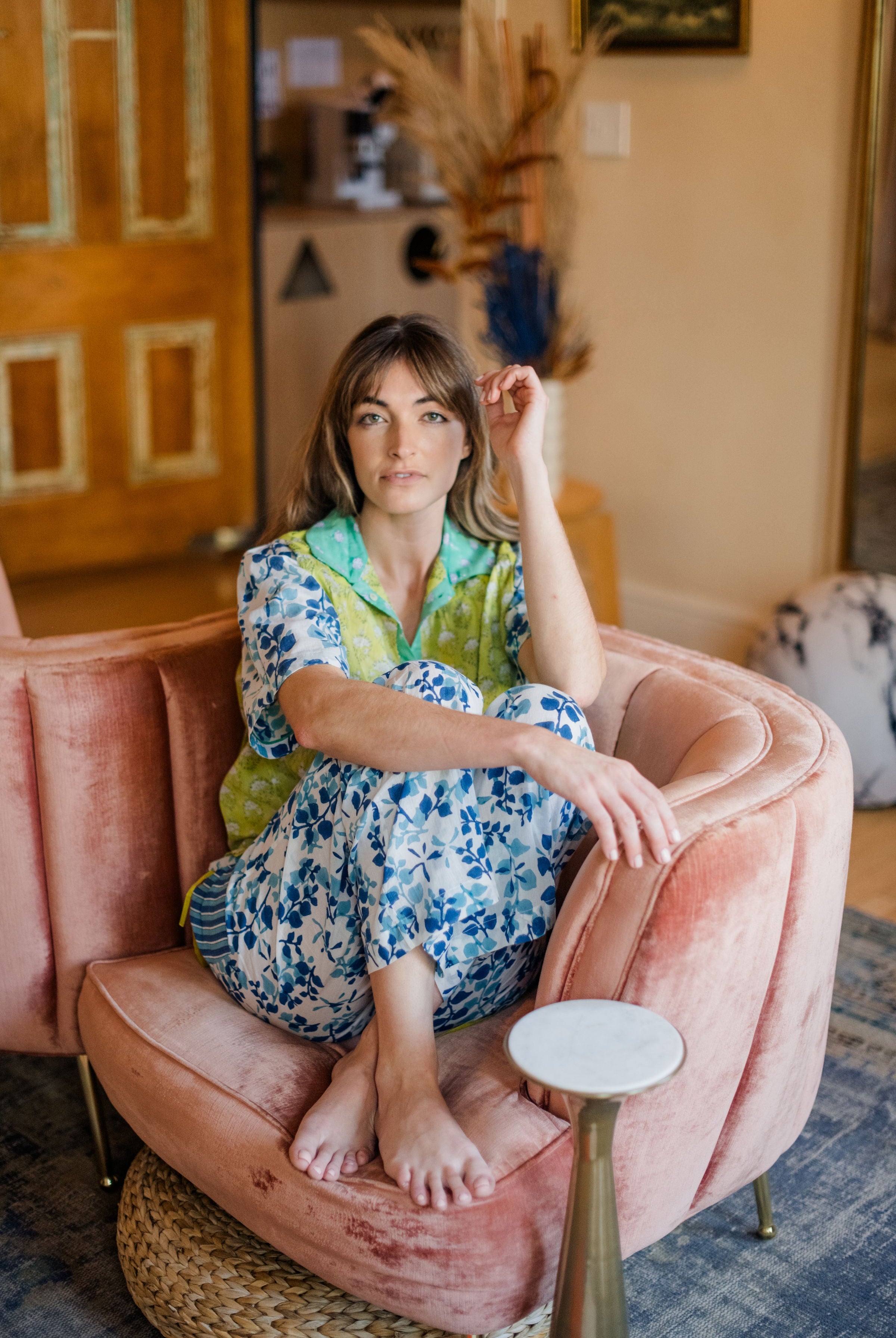 woman sitting comfortably in chair wearing Livi Pajama Pant