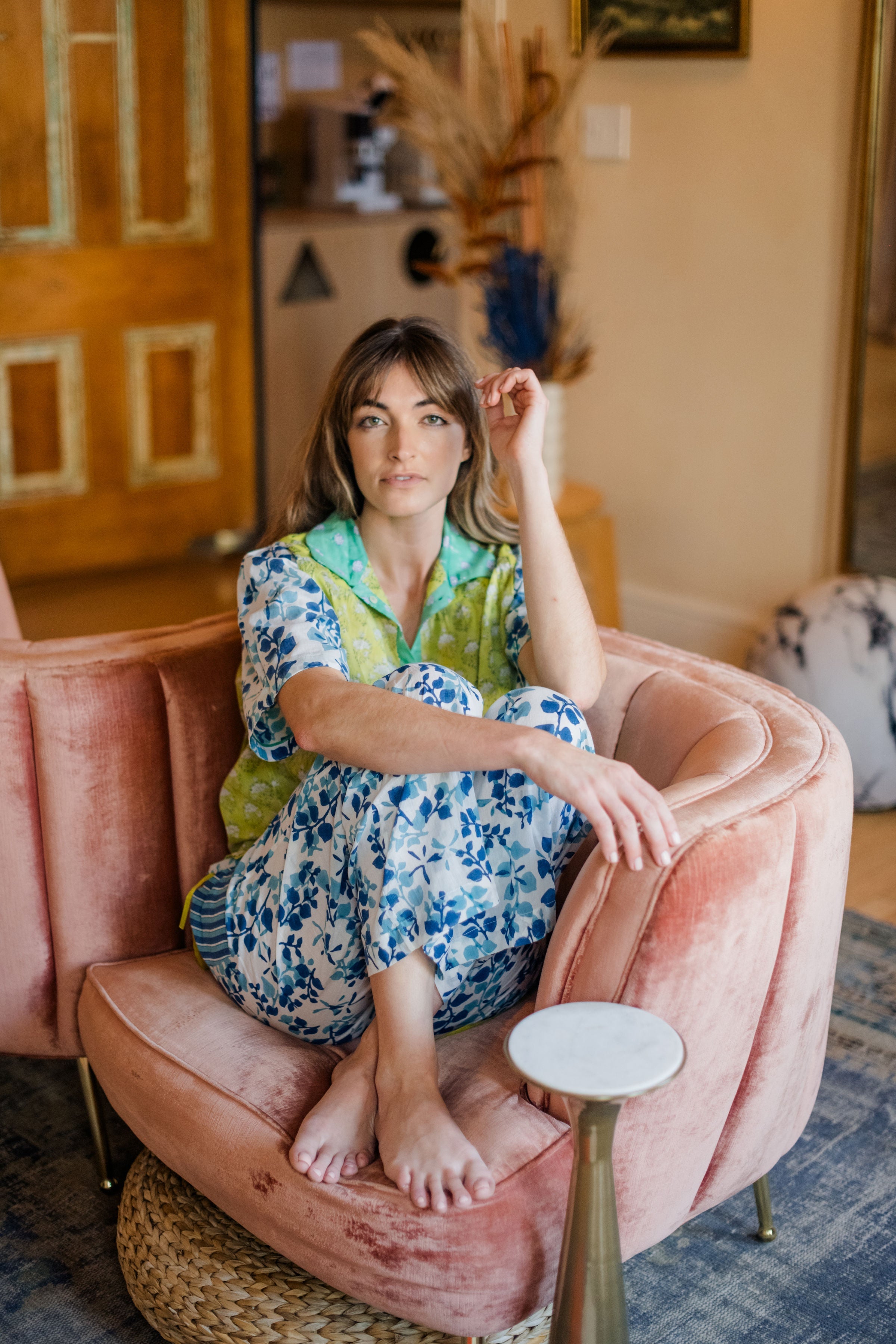 woman sitting comfortably in chair wearing Livi Pajama Pant