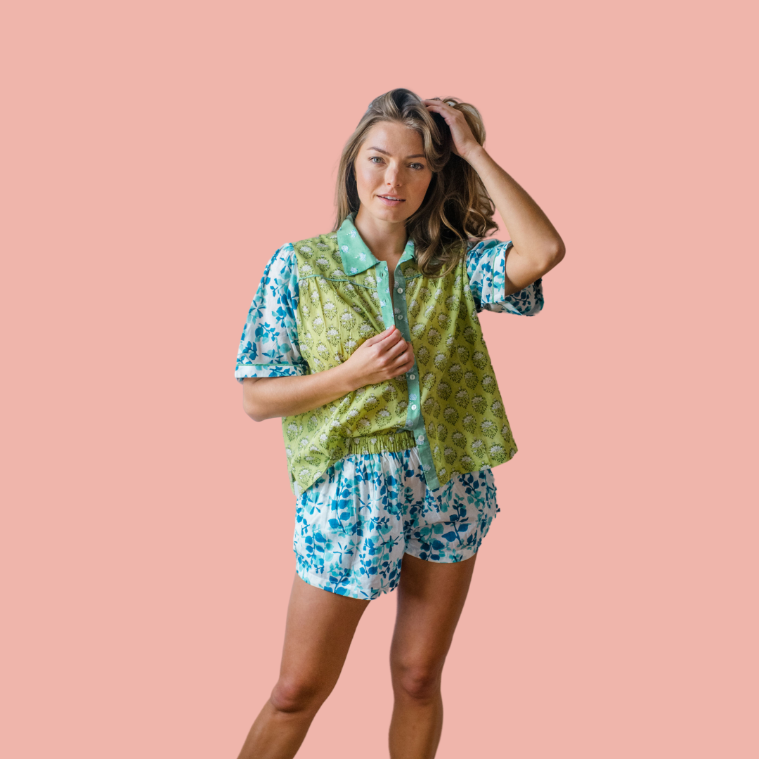 Woman wearing luxurious Dorothy Pajama Top