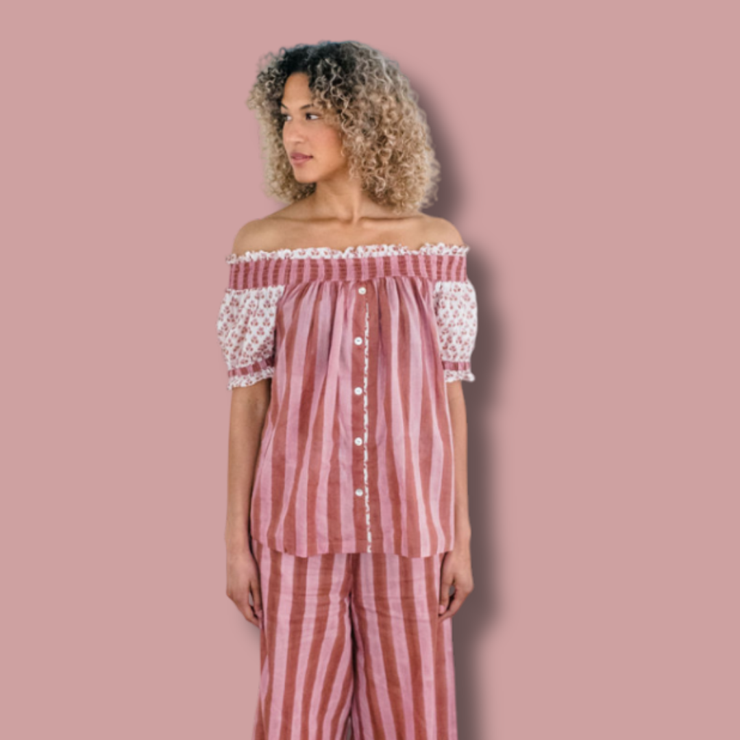 The Winnie Top and Logan Stripe Pant by Sundara – a relaxed cotton pajama set featuring delicate hand-block prints on the top and stylish striped pants for effortless comfort