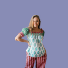 women wearing Winnie Pajama Top made of sustainable materials