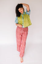 Woman wearing the Dorothy Top and Logan Pant by Sundara – a comfortable cotton pajama set featuring hand-block prints and a relaxed silhouette for everyday ease
