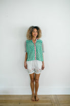 Woman wearing the Dorothy Top and Jae Short by Sundara – comfortable cotton sleepwear with hand-block prints, offering relaxed style and effortless comfort.”
